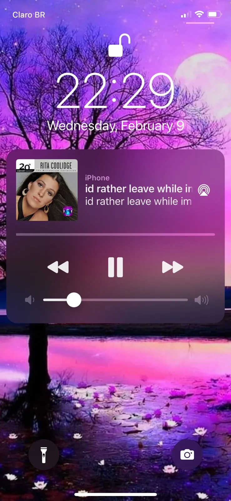 iPhone lock screen showing VIP Radio media controls and album artwork